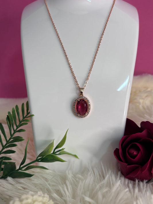 Rose Gold Oval Pendant with Ruby Red Crystal