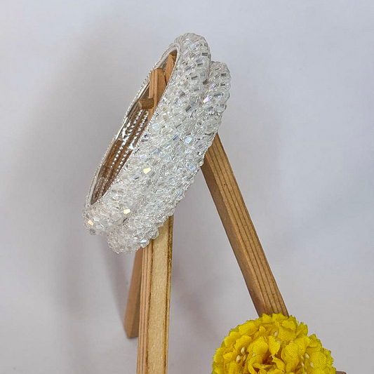Stylish white-toned bangle adorned with sparkling rhinestones